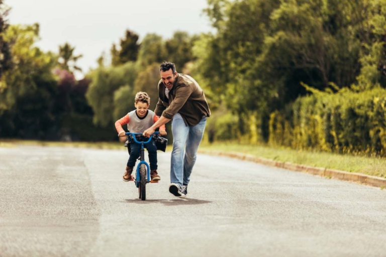 Father with son biking